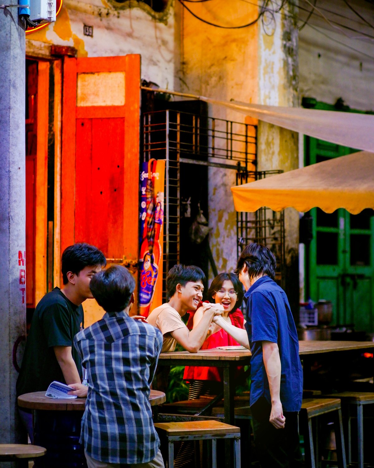 Real friends connecting around a café table